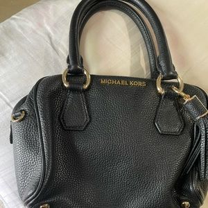 This is a small Leather MK bag.  Almost new.